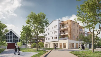 Logements neufs Eclosia à Trignac : immeubles en bois clair à balcons, jardin arboré et allée